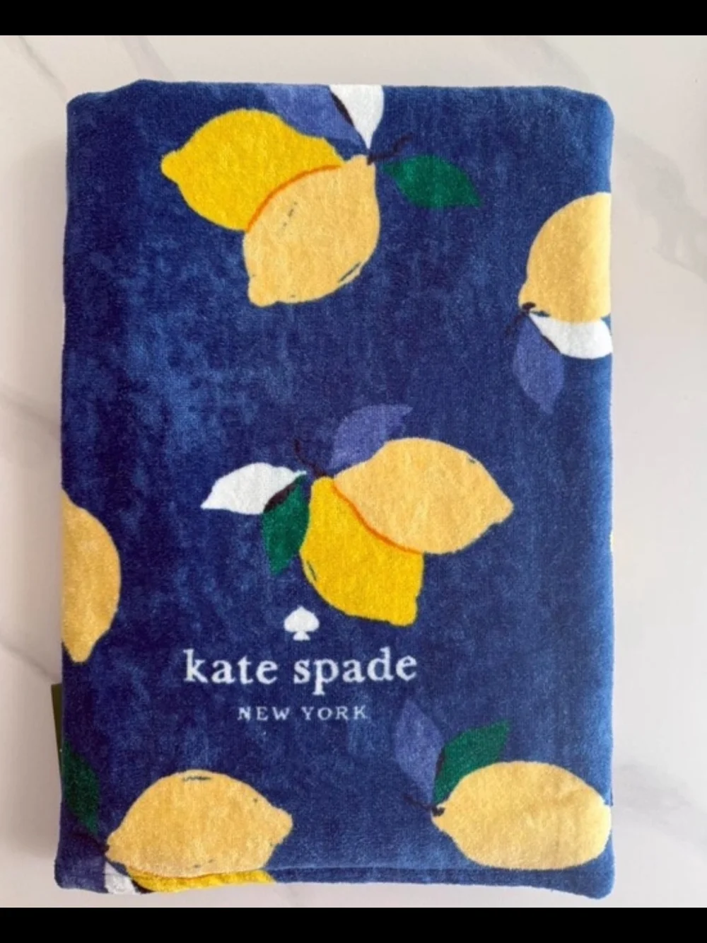 Kate Spade navy and yellow lemon print towel